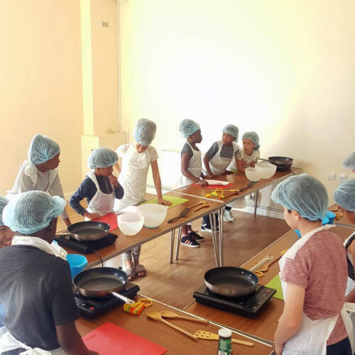 Kids cooking in hall